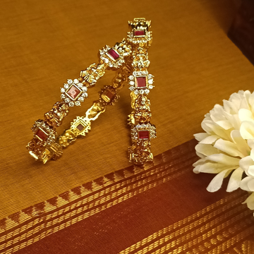 Zenshyn Ornate Lakshmi pink AD stone bangle (a pair of bangles) - occasion wear